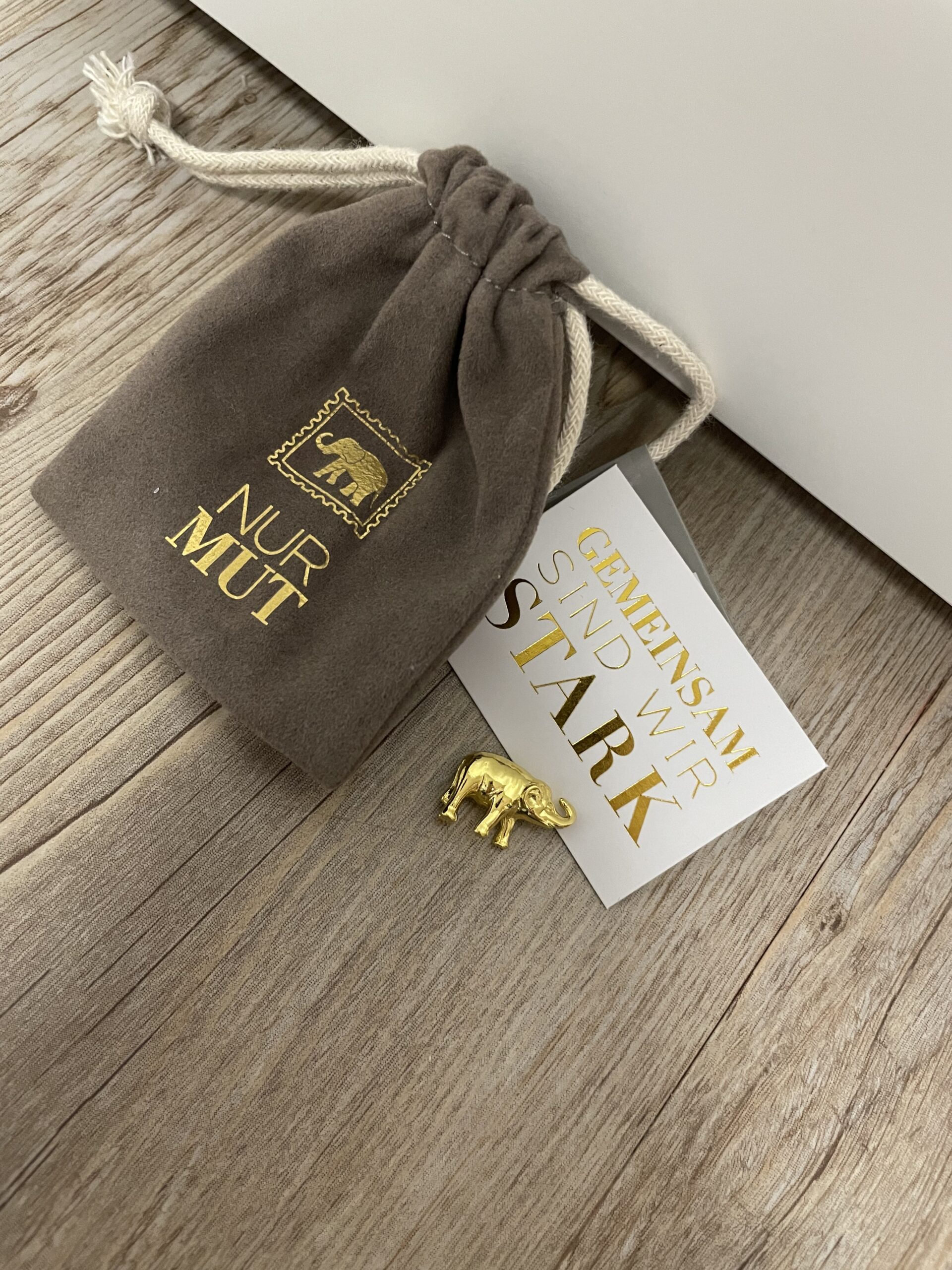 Giving kleiner Glücksbringer Nur Mut